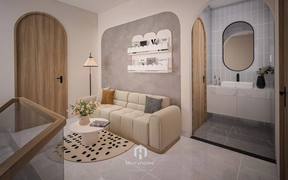 Thiết kế nội thất nhà liền kề Sofa đặt sát tường, kết hợp kệ âm và cửa vòm giúp tận dụng tối đa diện tích nhỏ