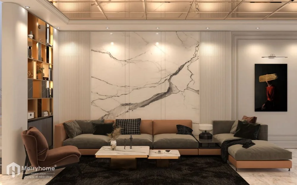 Thiết kế nội thất nhà liền kề Sofa chữ L đặt ngang tường, kệ trang trí bên cạnh tạo điểm nhấn và cân bằng không gian